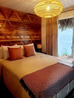 Deluxe Double Room, Patio, Garden View | In-room safe, iron/ironing board, free WiFi