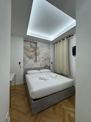 Habitación doble Confort, 1 cama Queen size | Caja de seguridad en la habitación y wifi gratis 