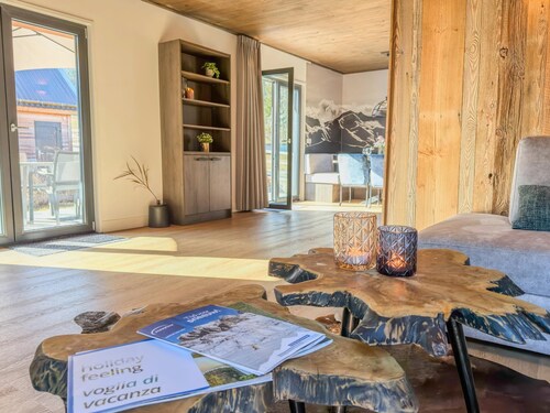 Luxueux chalet alpin au bord d'un lac avec sauna