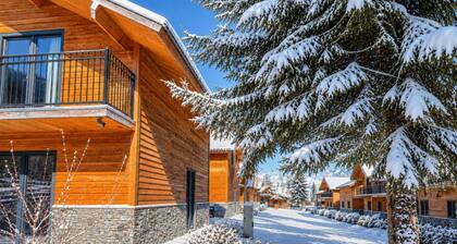 Luxueux chalet alpin au bord d'un lac avec sauna