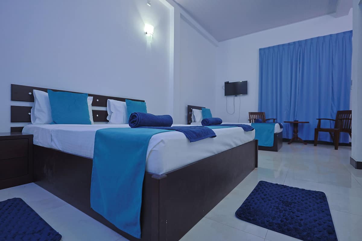 Standard Triple Room, Balcony | Desk, free WiFi