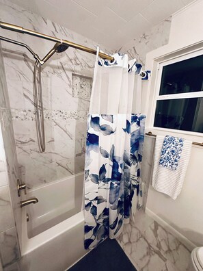 Hair dryer, towels, soap, toilet paper