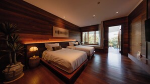 A modern bedroom with two beds, a large window, and a potted plant. - Baan Krai Nao The Riverfront (Phra Pradaeng)
