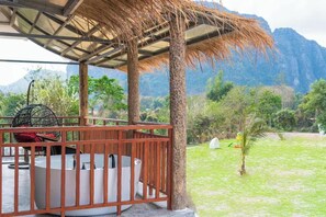 Deluxe Double Room, Garden View | Terrace/patio - Larng Yay Hotel (Vang Vieng)