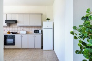Apartment, 2 Bedrooms, Kitchen, City View | Private kitchen | Full-size fridge, microwave, oven, stovetop - Yellow Canvas 2-BR & Balcony in Larnaca (Larnaca)