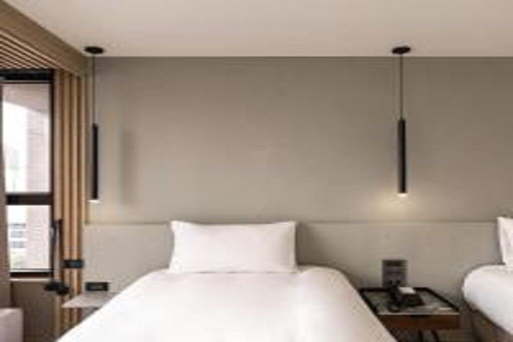 Habitación con 2 camas individuales, vista a la ciudad | Caja de seguridad en la habitación, insonorización y wifi gratis 