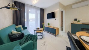 Apartment (4A) | Living area | Flat-screen TV - Apartamenty Sun & Snow Enklawa III (Mielno)