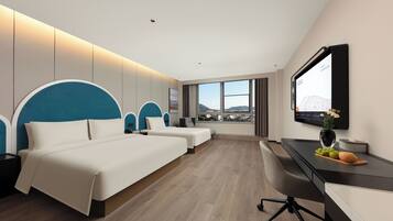 Desk, laptop workspace, blackout curtains, iron/ironing board