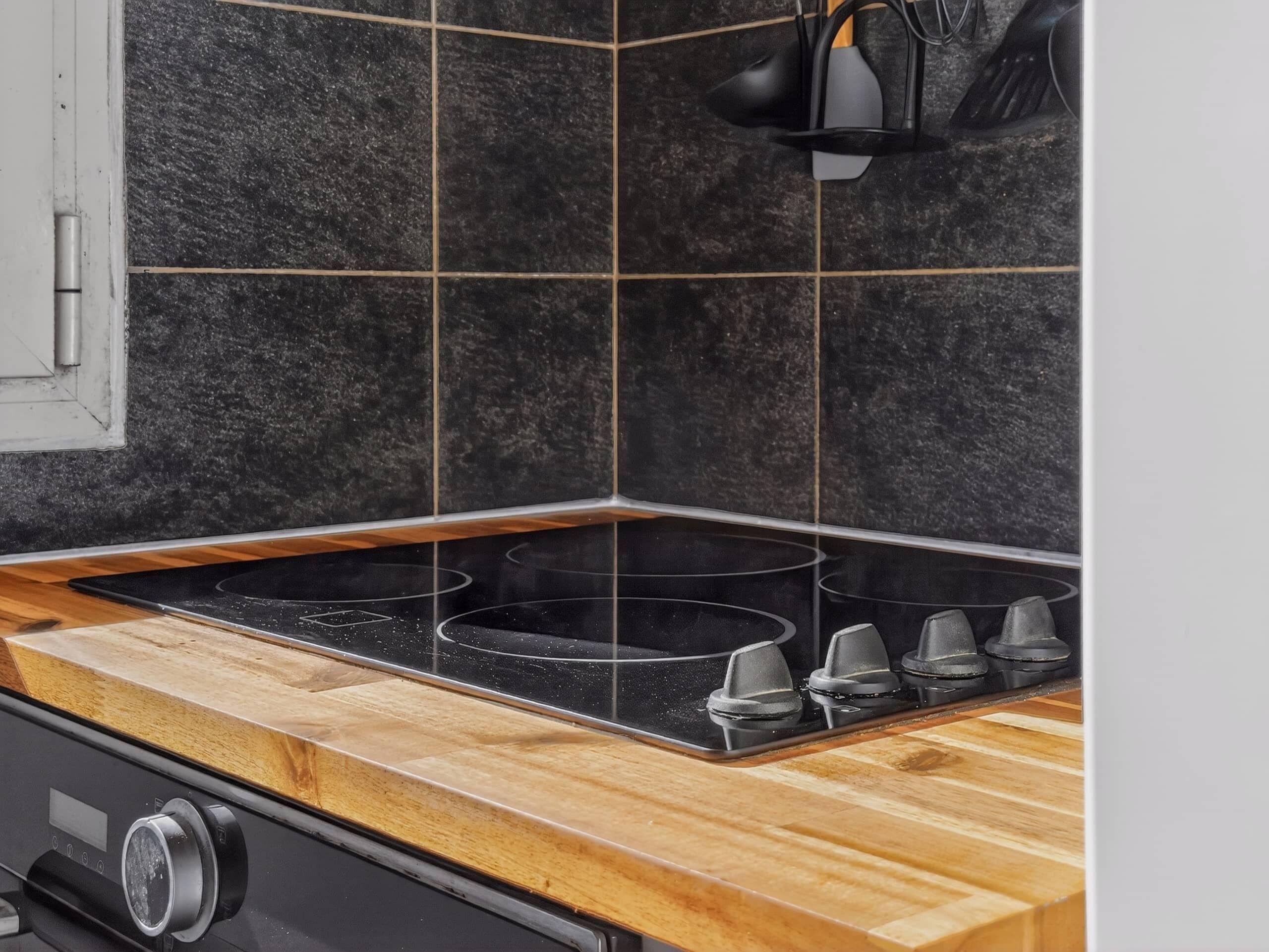 Comfort Apartment, Balcony, Beach View | Private kitchen | Toaster, high chair, spices, cleaning supplies