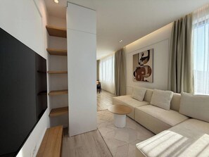 Apartamento, vistas a la ciudad | Zona de estar