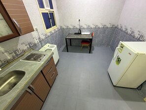 Departamento familiar | Cocina privada | Frigobar, parrilla de estufa y utensilios de cocina 