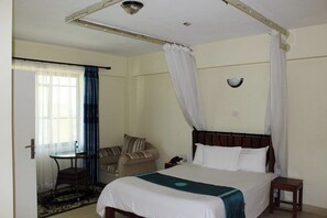 Deluxe Single Room | Individually decorated, individually furnished, free WiFi, bed sheets - Meru Paramount Hotel (Meru)