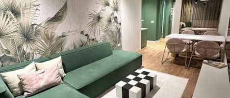 Apartment | Living area | 32-inch flat-screen TV with satellite channels