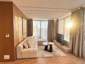 Apartment, Balcony, City View | Living area | 32-inch flat-screen TV with satellite channels - City Centre Penthouse  (Tirana)