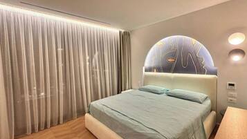 Apartment, Balcony, City View | Bed sheets