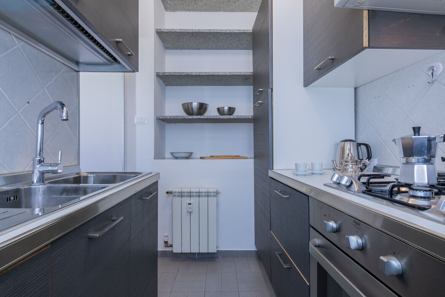 Fridge, oven, electric kettle, cookware/dishes/utensils
