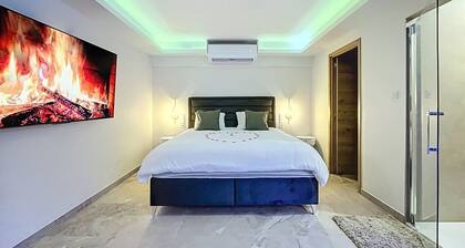 Suite de Luxe Ăvasion romantique&bien-ĂȘtre absolu lit King size jacuzzi.