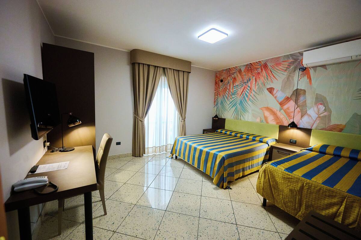Deluxe Triple Room | In-room safe, desk, iron/ironing board, free WiFi