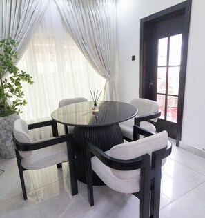Dining - Luxury New 2-Bedroom Apartment, 5-Min Walk to Elegushi Beach”. (Lekki)