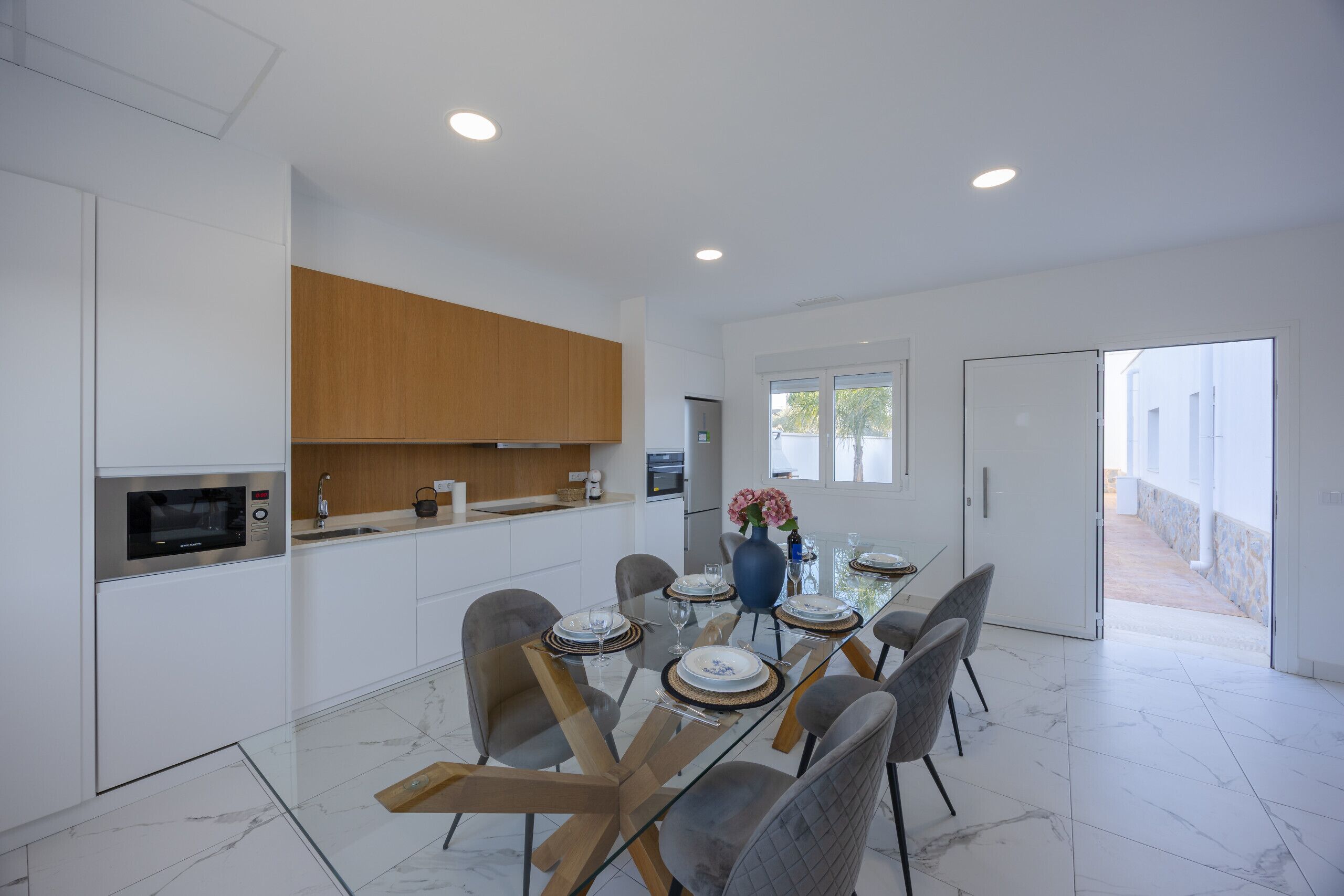 Dishwasher, coffee/tea maker, cookware/dishes/utensils