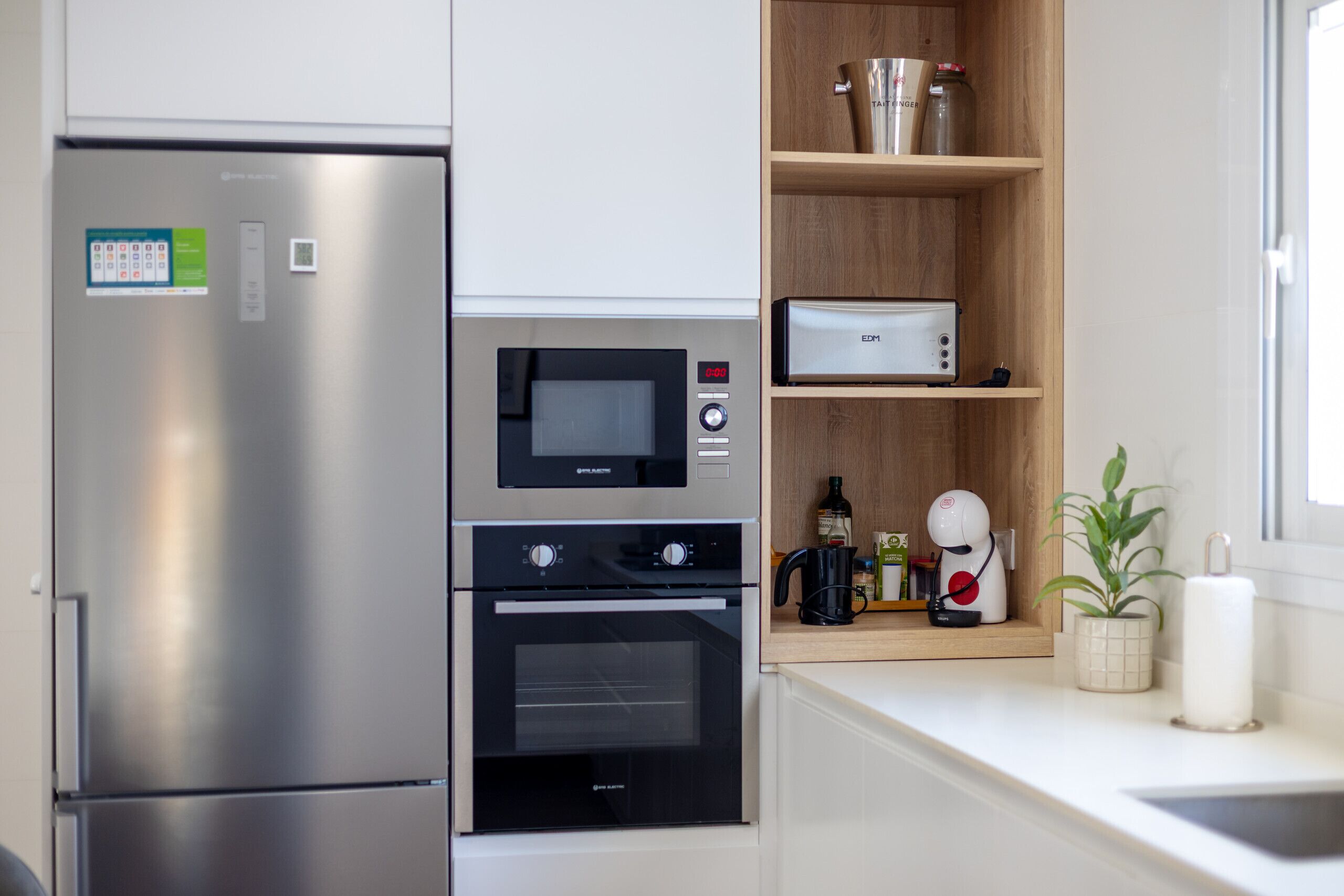 Dishwasher, coffee/tea maker, cookware/dishes/utensils