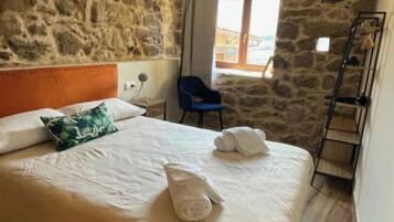 2 slaapkamers, een strijkplank/strijkijzer, gratis wifi, beddengoed