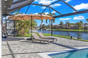 Outdoor pool, a heated pool - Tiki Time! - Newly Listed (Cape Coral)