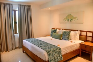 In-room safe, desk, blackout curtains, iron/ironing board - Orchid Villas by Sea Resorts (Quatre Cocos)