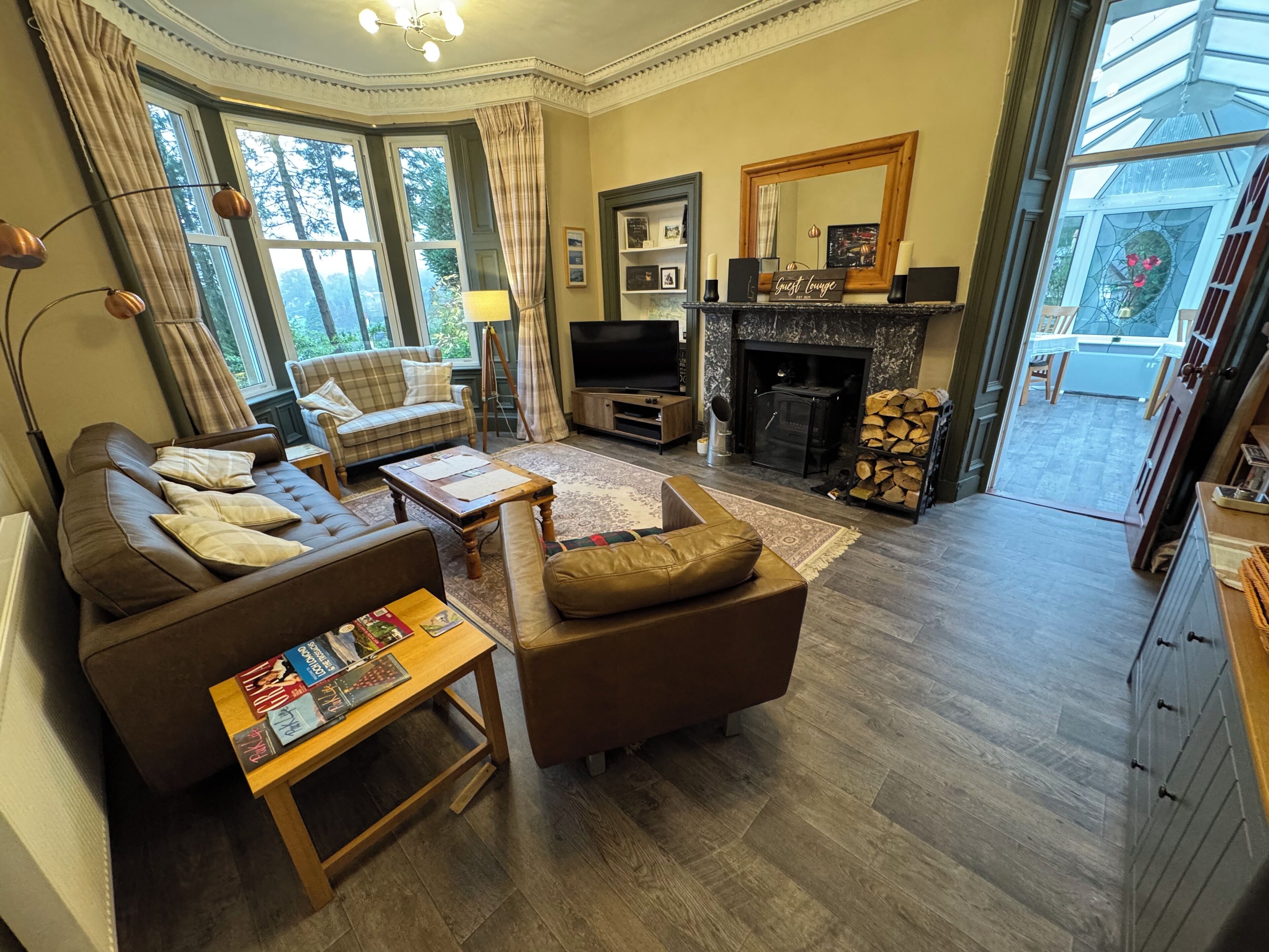 42-inch LED TV with satellite channels, books, video library