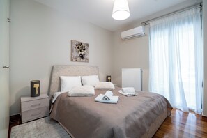 1 dormitorio, tabla de planchar con plancha, Internet y ropa de cama