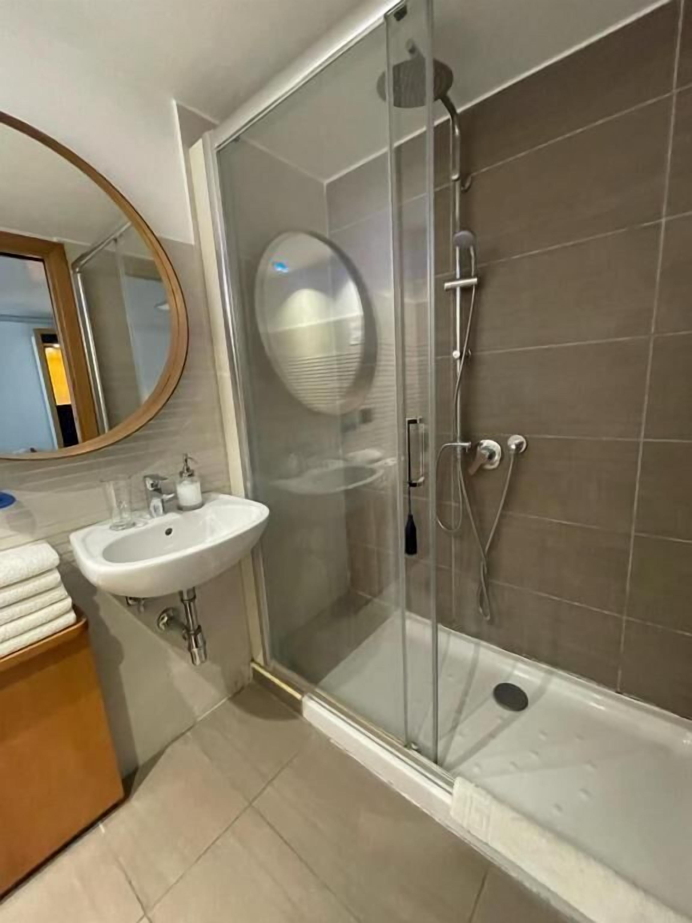 Shower, free toiletries, hair dryer, towels