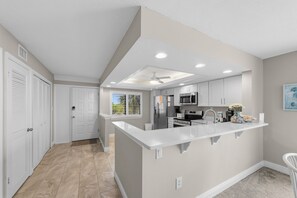 Fridge, microwave, oven, stovetop - Sanibel 3rd-Floor Corner Retreat—Panoramic Gulf Views, Private Lanai & Direct Beach Access | Remodeled 2BR/2BA | King Suite + Twins | Sleeps 6 (Sanibel Island)