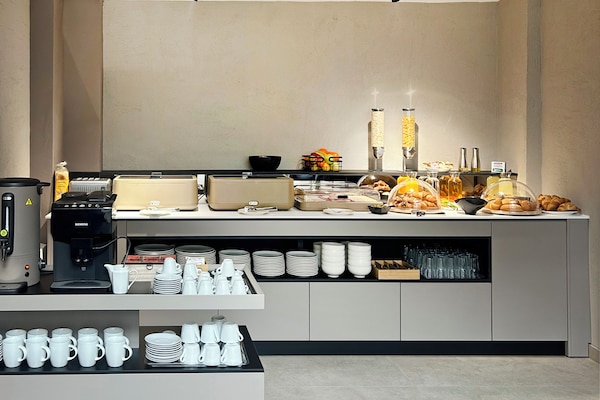 Dagelijks ontbijtbuffet inbegrepen