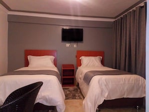 Deluxe Twin Room, City View | Individually decorated, individually furnished, free WiFi, bed sheets - Camsupreme Studios Meru  (Meru)