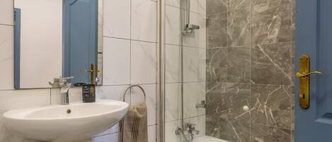 Hair dryer, towels, soap, shampoo