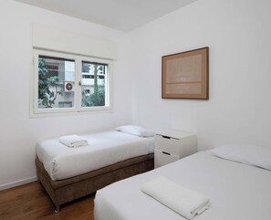 Iron/ironing board, travel cot, WiFi, bed sheets - Renovated 2BR Bauhaus Apt in Gordon by HolyGuest (Tel Aviv-Yafo)