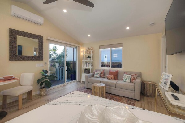 Apartment, 1 King Bed with Sofa bed, Patio, Garden View (Monarch Cove - C) | Living area - Monarch Cove - Unit C  For 4ppl (Oceanside)