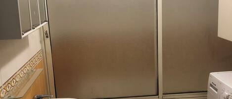 Bidet, towels, soap, toilet paper