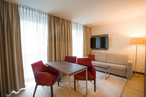 Superior Suite, City View | Living area