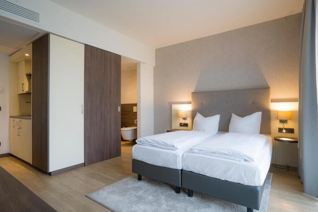 Deluxe Double Room, City View | In-room safe, laptop workspace, blackout drapes, soundproofing