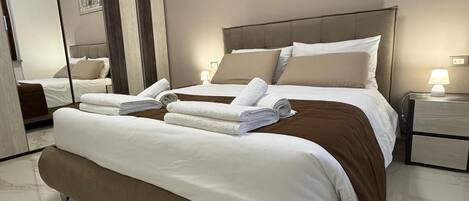 مكواة/لوح كي وواي فاي وملاءات أسرّة