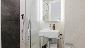 Shower, towels, soap, shampoo