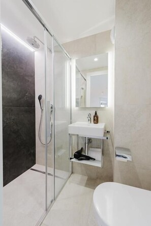Shower, towels, soap, shampoo