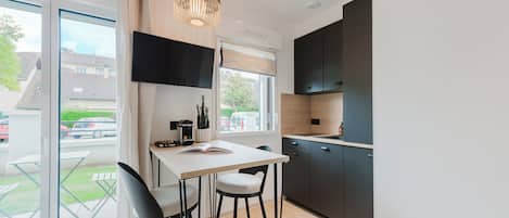 Fridge, microwave, cookware/dishes/utensils
