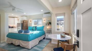 Studio, 1 King Bed, Patio, Garden View (Monarch Cove - B) | Individually decorated, individually furnished