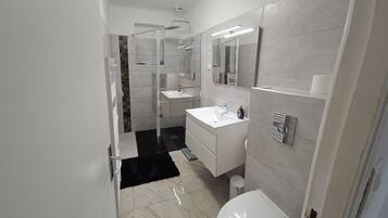 Hair dryer, towels, soap, toilet paper