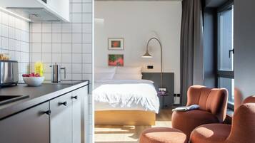 Premium bedding, desk, laptop workspace, blackout curtains