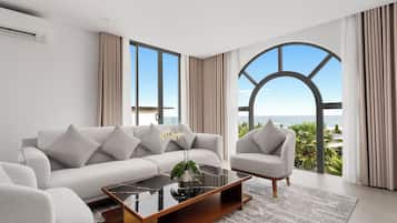 Standard Villa, Non Smoking, Kitchen (Living Room) | Living area | 43-inch LCD TV with cable channels