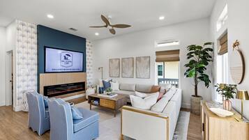 TV connectée, cheminée, jeux vidéo, livres