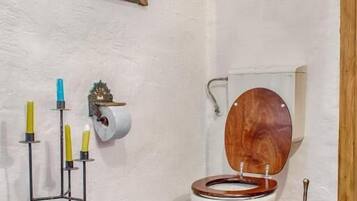 Suite romántica, vista a la ciudad | Baño